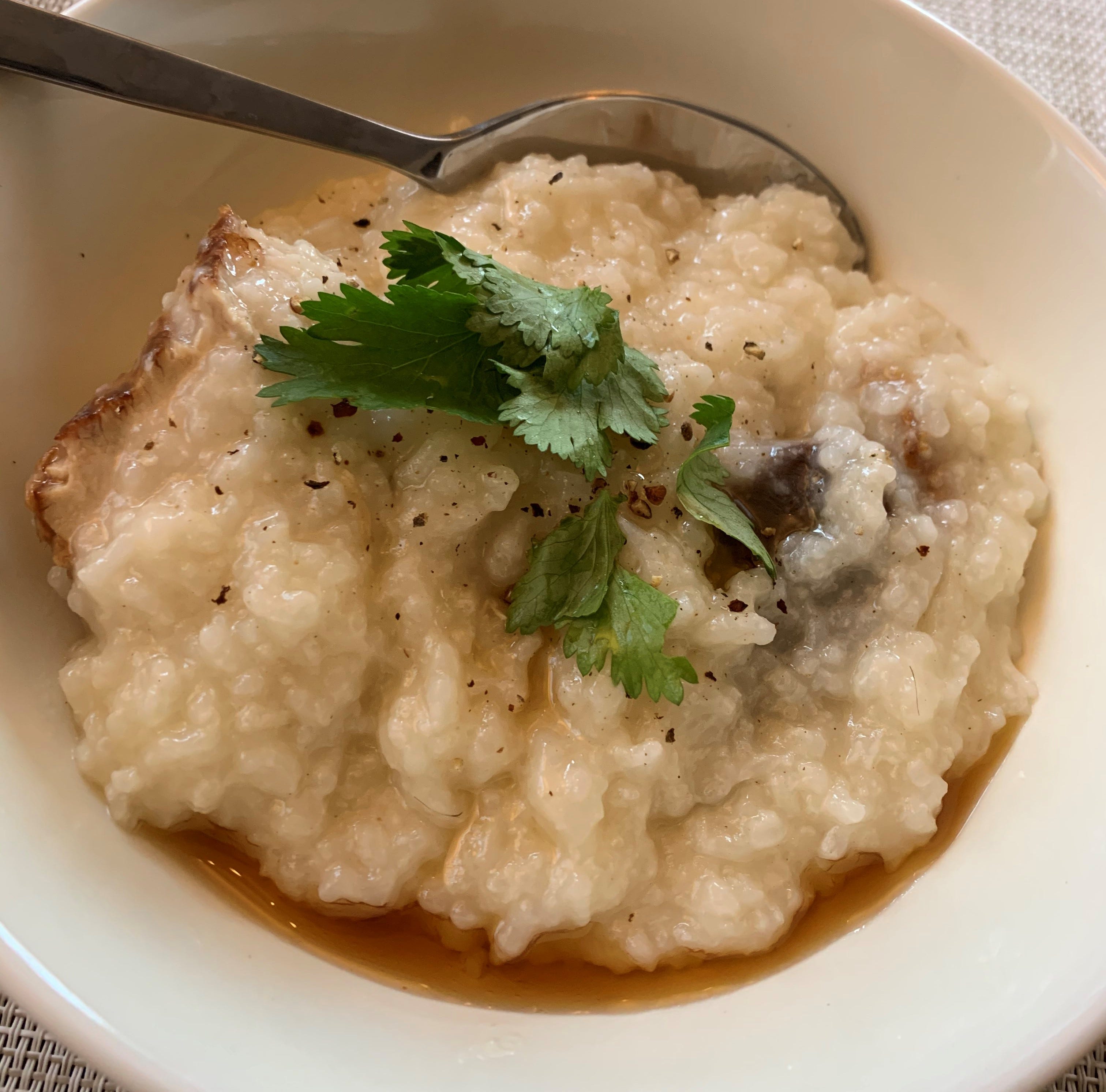 Wild turkey meat congee is plated in this photo by LiLi Wong.
