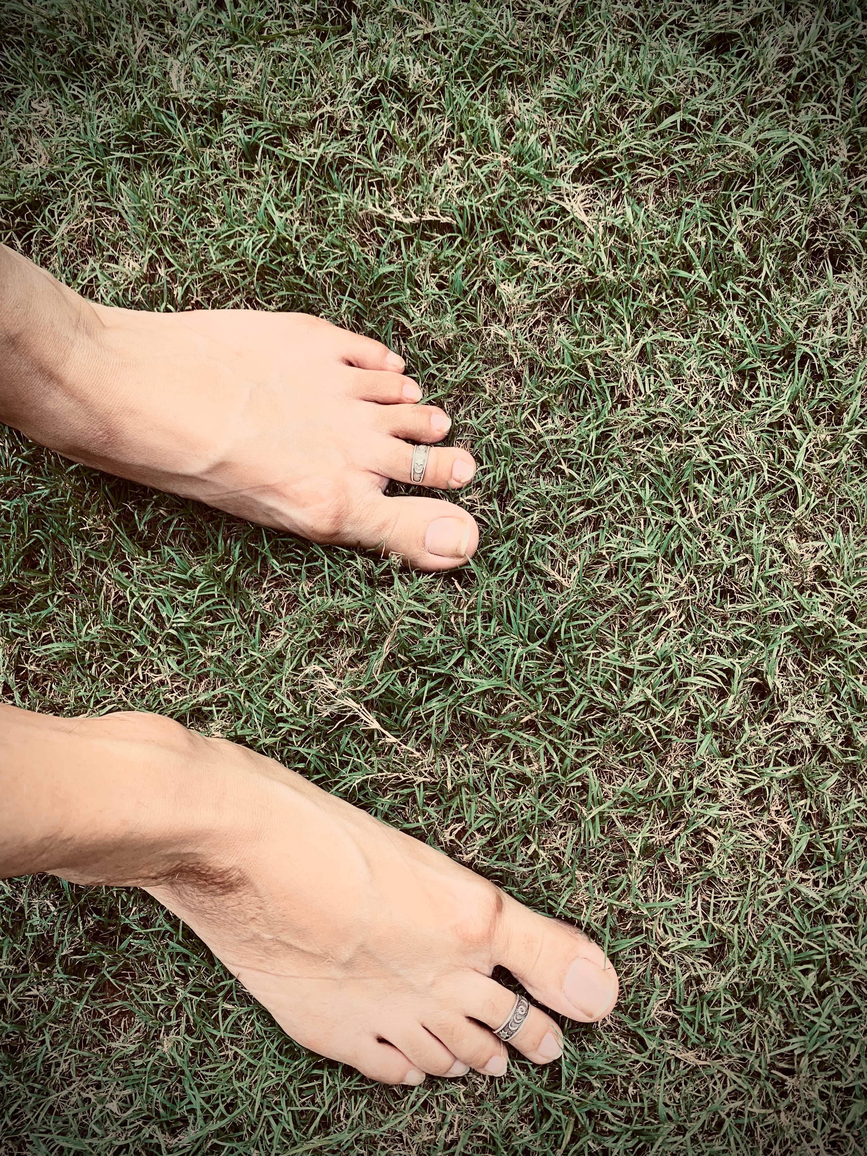 running barefoot on grass