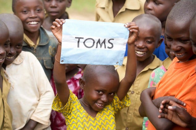 The Paradox of Giving. TOMS shoes was founded in 2006 around… | by Matthew  Biggins | Medium