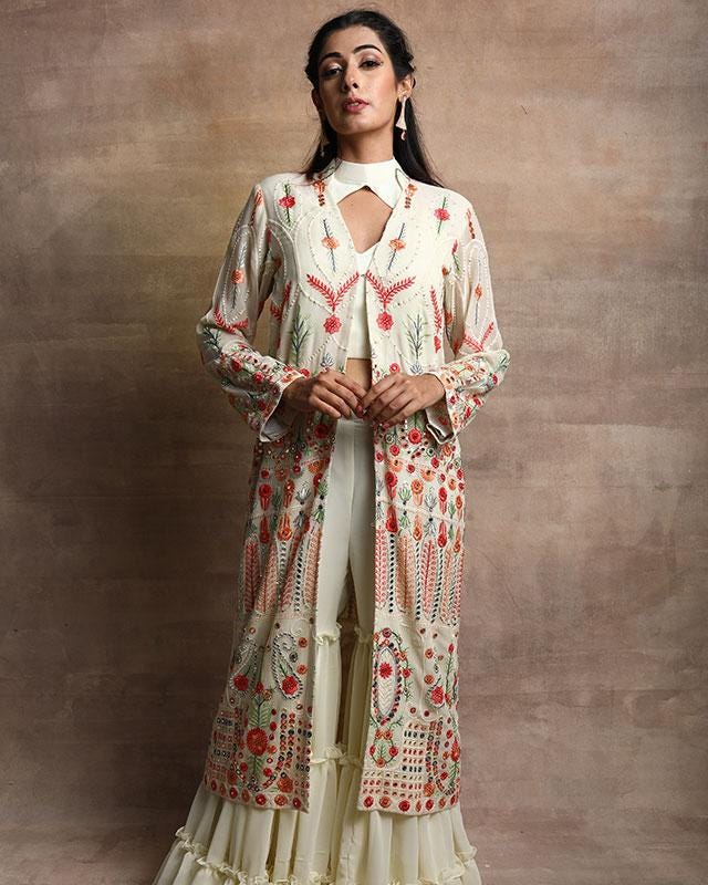 Embroidered Georgette Off-White Indo Western with scarlet tones of res floral hues and abstract pants.