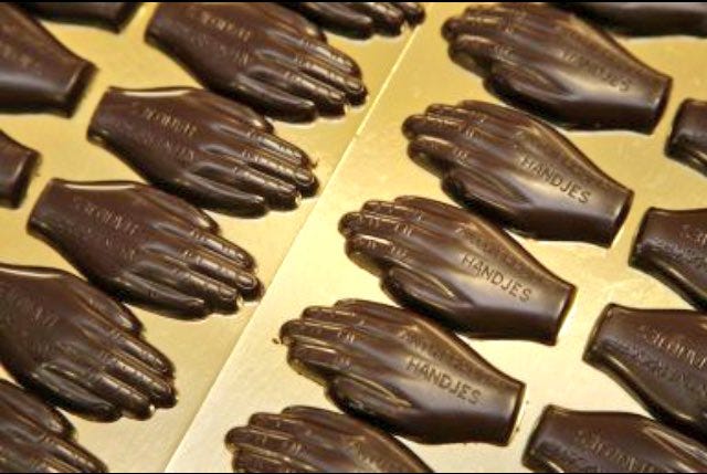 The Atrocity And Brutality Of Belgium s Black Hand Chocolates By 