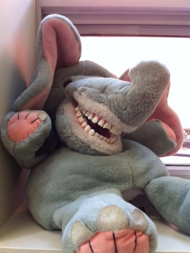 teddy bear with human teeth