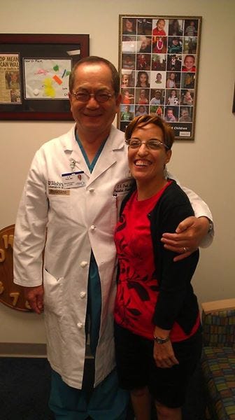 July 2013: Dr. Park and me at my four-month evaluation after SDR.