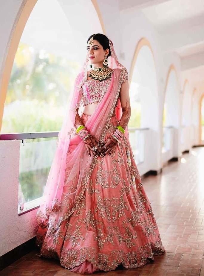 pink and green bridal lehenga