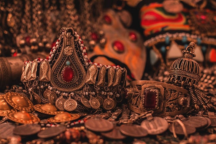 A pile of gold coins and jewelry.