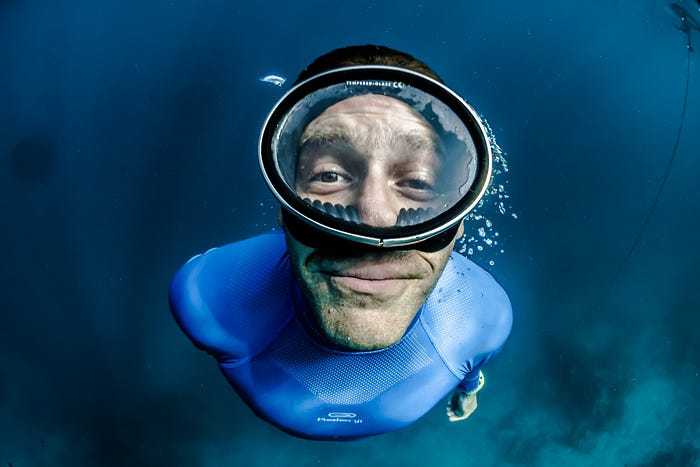 A diver showing 4–8–7 breathing method to beat stress