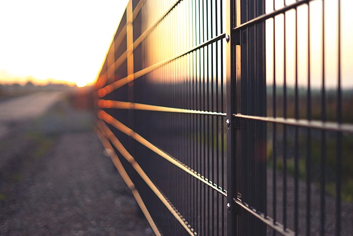 fence at sunset