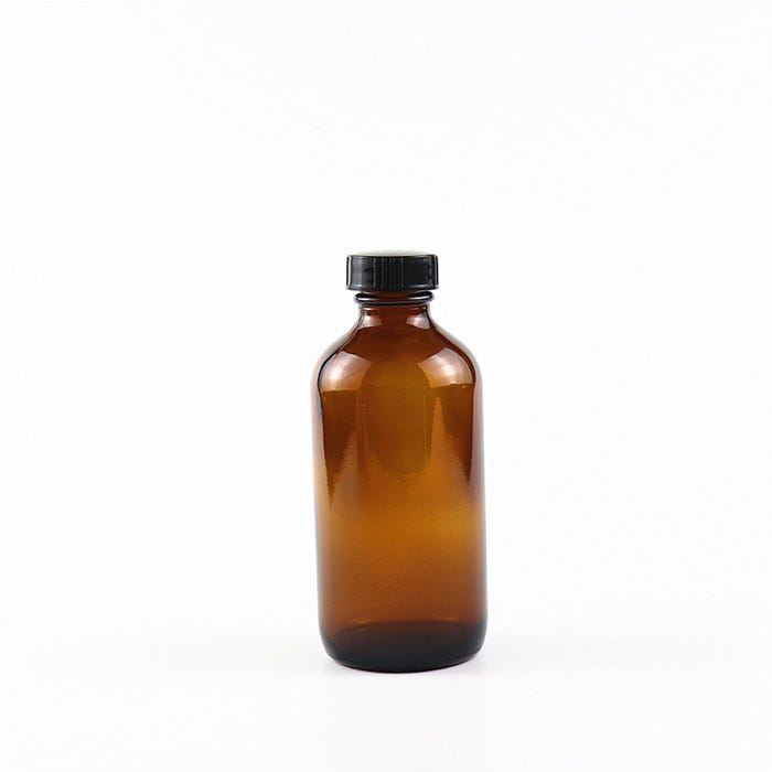 skin care products in glass bottles