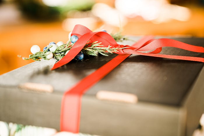 wrapped up gifts to send to employees to make them happier