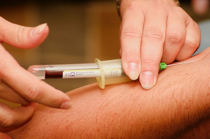 Procedure of taking out blood sample.