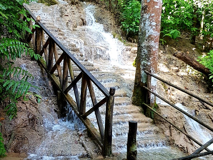 Photo of the Kuang Si waterfalls (water falling down stairs)