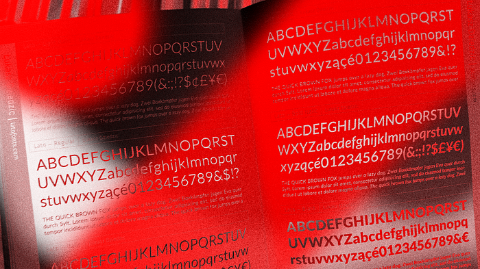 A taken image of the spread of the third Free Font Index, featuring the Lato font family by Łukasz Dziedzic. Image is re-colourised in red, black and white.