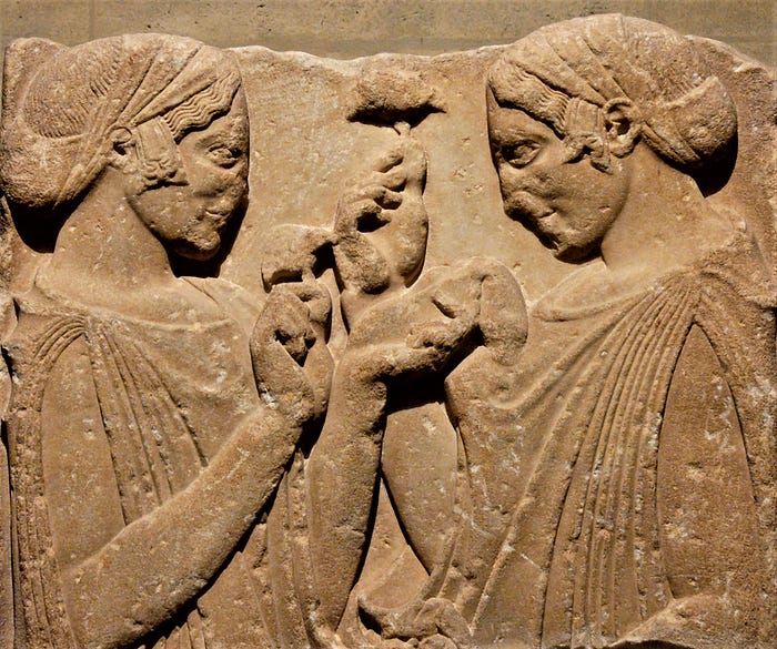 The “Exaltation of the Flower,” a Greek relief of uncertain meaning, today in the Louvre. (source)
