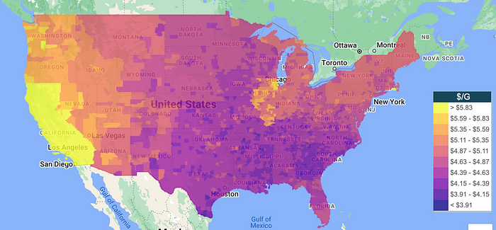 A map of the United States is shown with a yellow-to-red gradient of colors by county. Yellow is where gasoline is more expensive, and can be found more concentrated in California, but with pockets in Illinois and other states. Deep red (almost purple) can be found mostly in the South, but also in other places.
