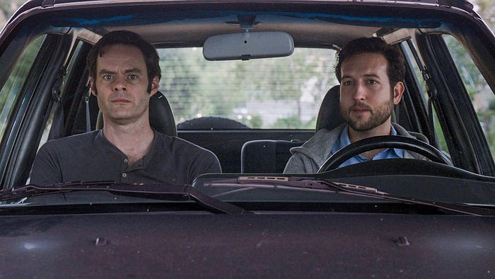 Barry and Chris sitting in Chris’ car, both looking very unnerved.