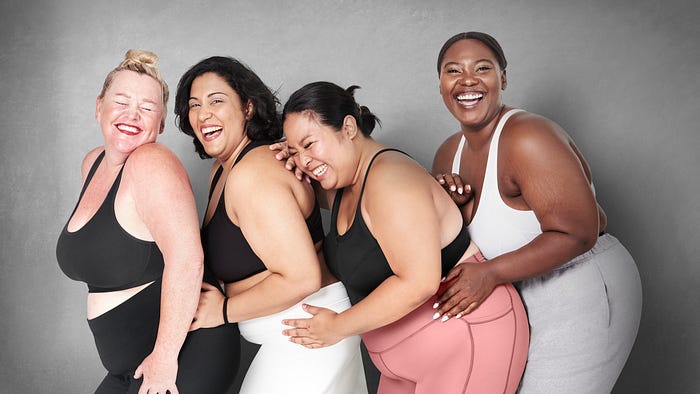 A group of plus-size women of all races wearing activewear that is size inclusive and supportive of people of all sizes, content relevant to body mass index (BMI), level of fitness, health, wellness, exercise, nutrition, healthy living, healthy lifestyle, weight stigma, anti-fat phobia, new norm, healthy weight