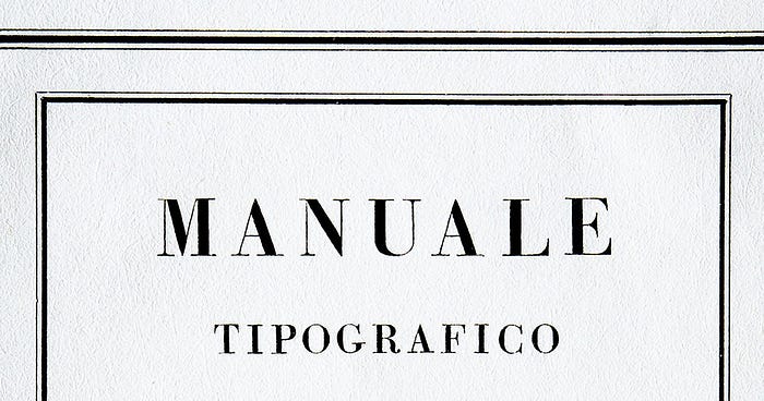 A close up title page from Bodoni’s Manuale Tipografico, showing the book’s title in Bodoni’s tall-thin letterforms