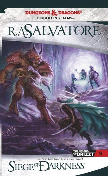 Cover of R.A. Salvatore’s book, “Siege of Darkness”. Drizzt Do’Urden, a Drow, fights while other Drow look on.