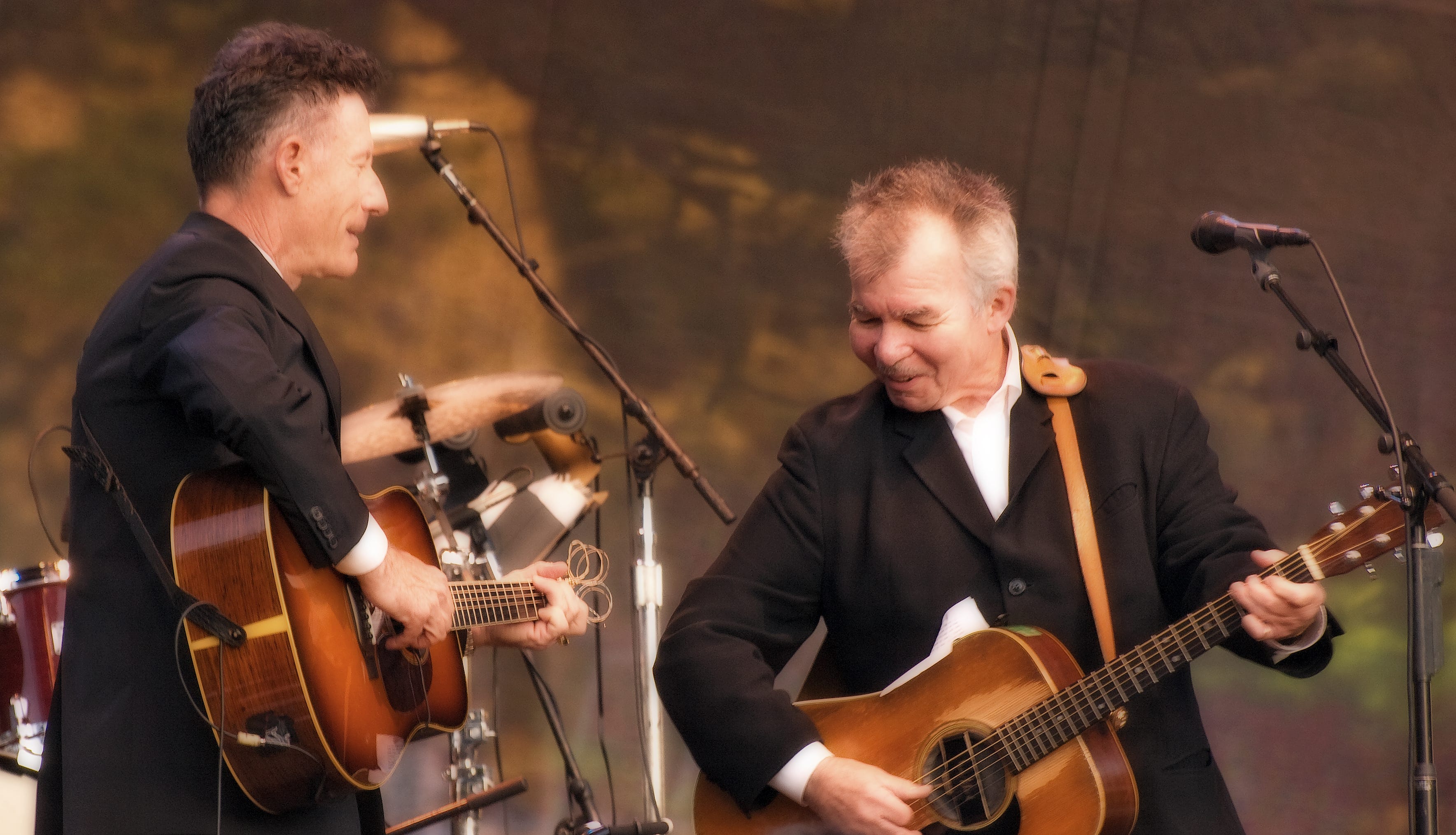 Photograph of John Prine and Lyle Lovett in concert.