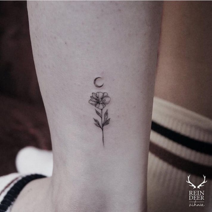 Crescent Moon And Lotus Flower Tattoo