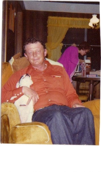 Dad and Wilbur in the sitting in his chair.