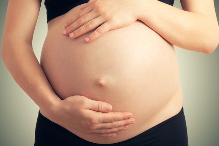 belly button during pregnancy gender