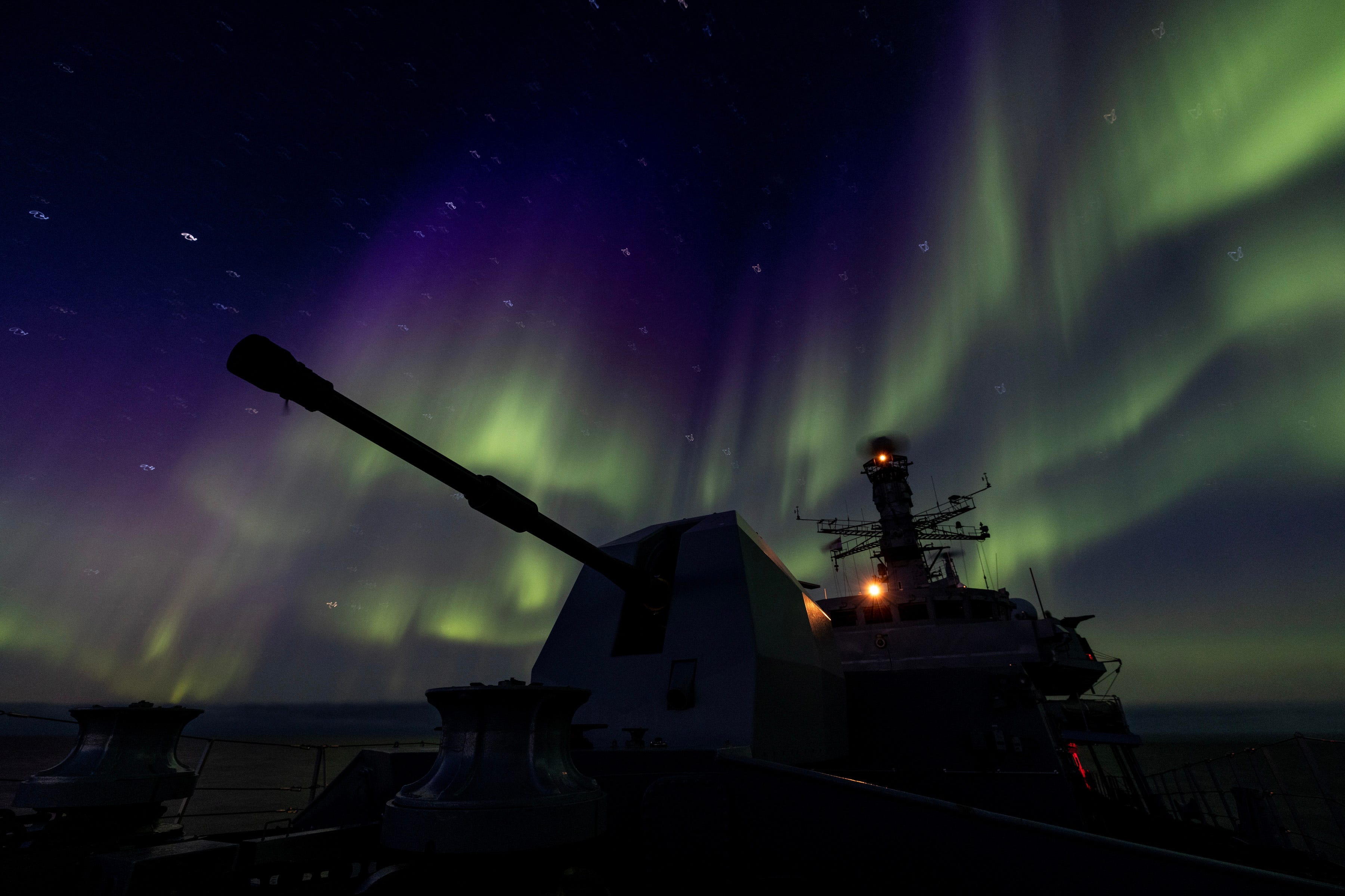 A stunning lights display envelops HMS Lancaster.