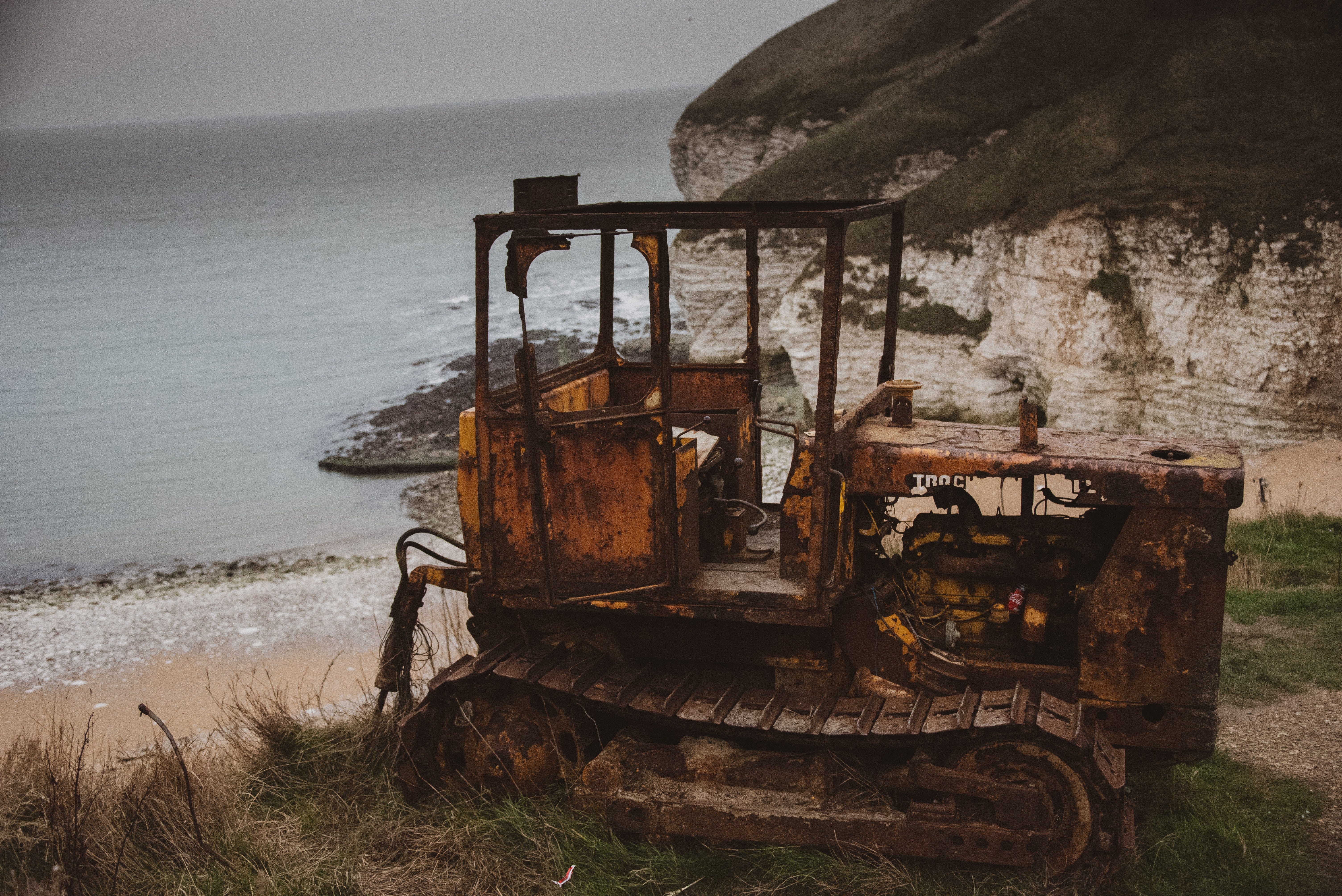 Rusty bulldozer at the seaside