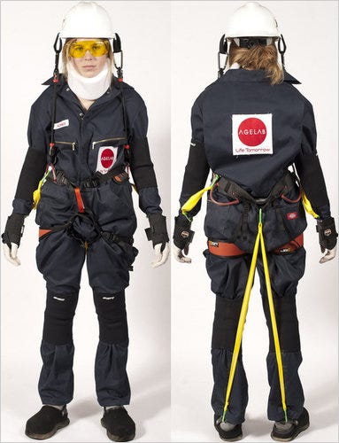 back and front photos of person in age simulation suit — gloves, helmet and lots of straps to inhibit movement