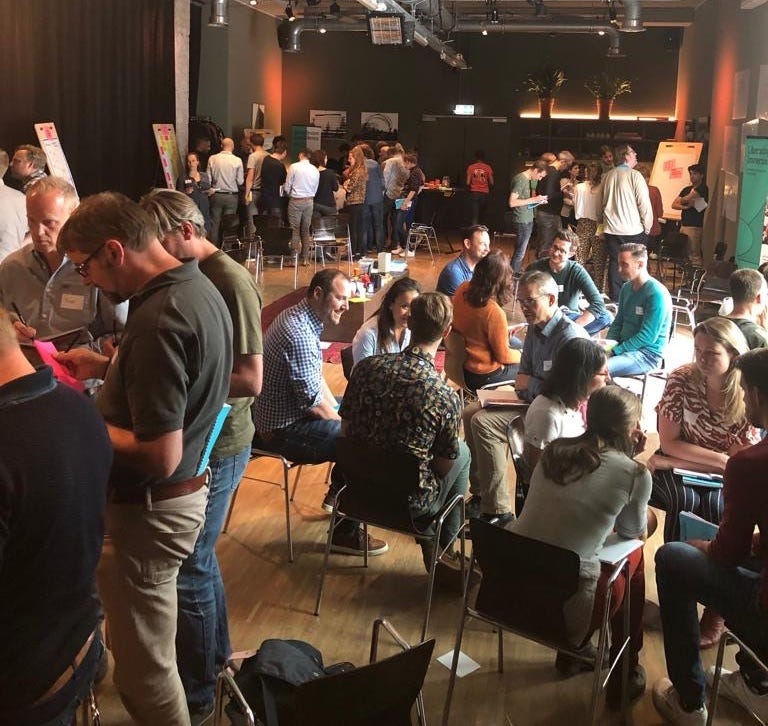 A crowded Gallery Walk during the Liberating Structures Immersion Workshop in Amsterdam, May 2019. A crowded Gallery Walk during the Liberating Structures Immersion Workshop in Amsterdam, May 2019.