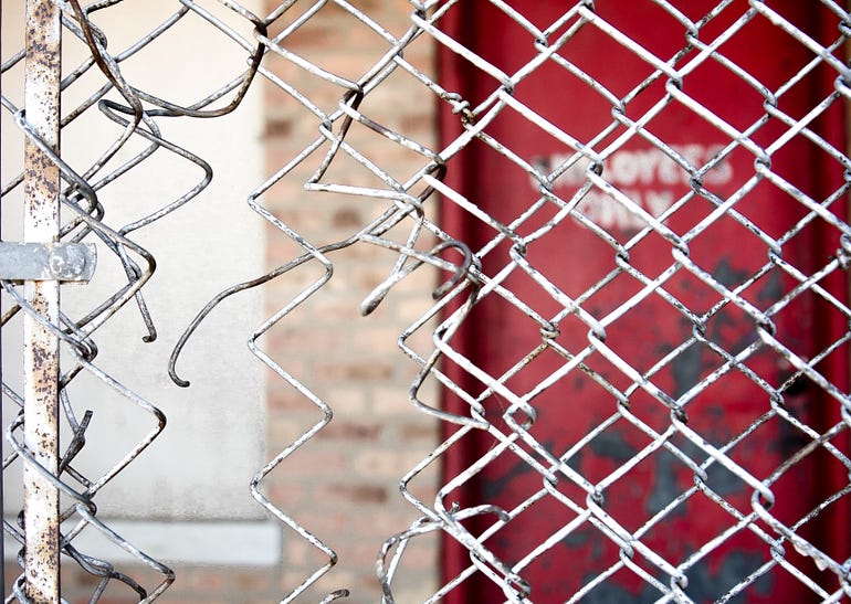Hole in Chain Link Fence