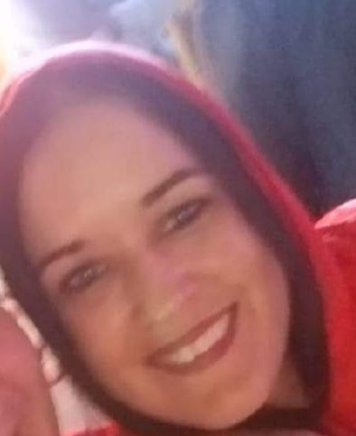Sarah smiles