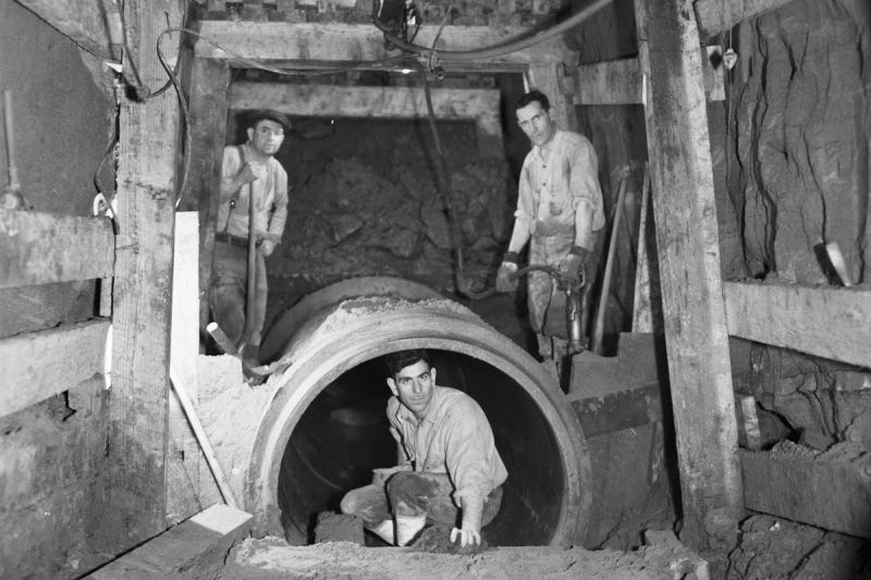 Men working in the sewer