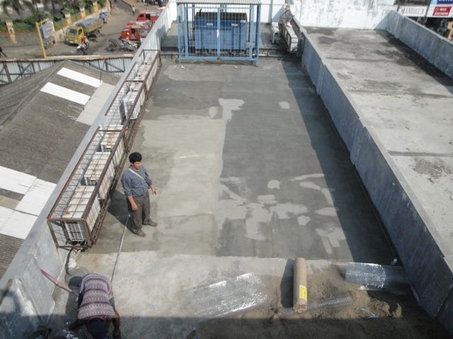 A man doing terrace waterproofing
