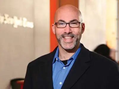 Photo of Peter S. Goodman, author of this book about widening economic inequality