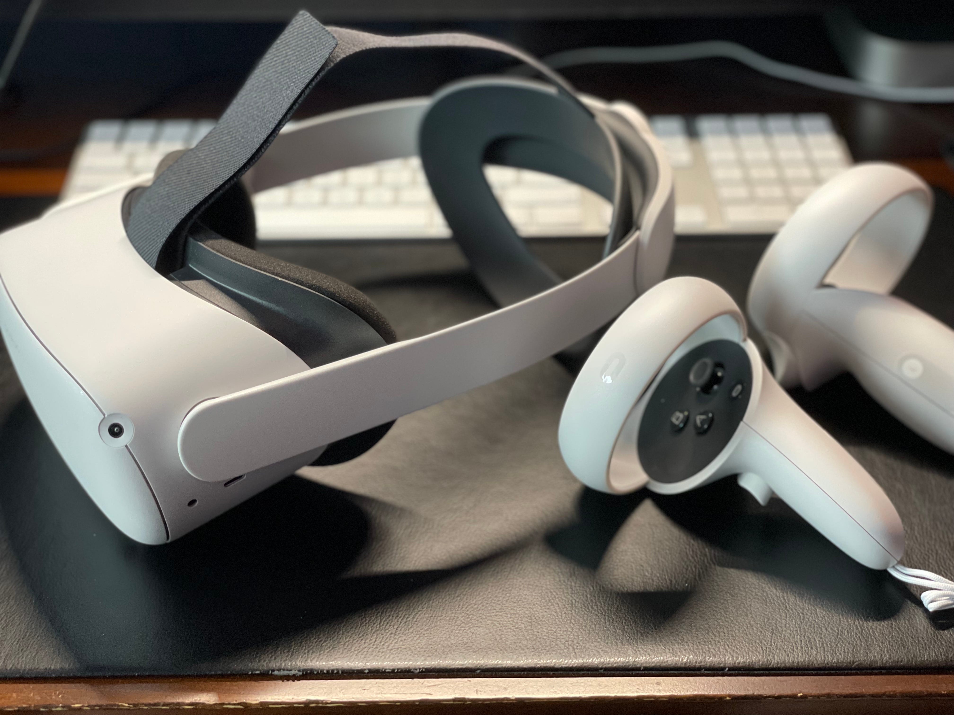 An Oculus Quest 2 headset with its two controllers