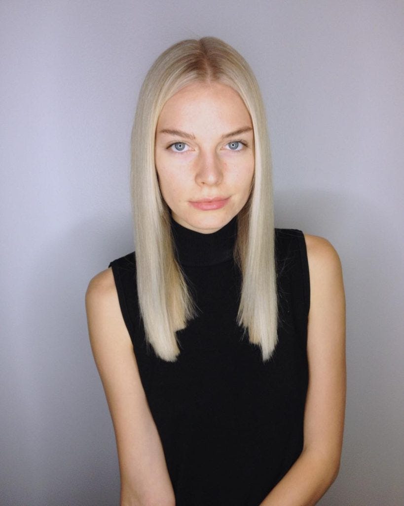 Sleek Blunt Cut With Center Part And Subtle Platinum Blonde Balayage By Hairstyleology Medium subtle platinum blonde balayage