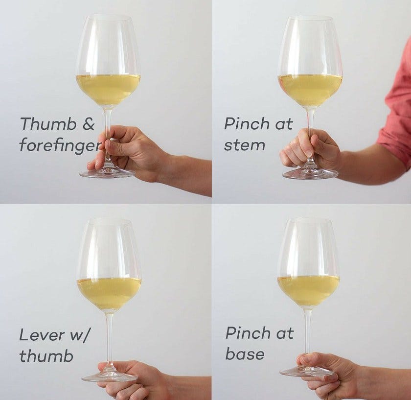 how to properly hold a wine glass