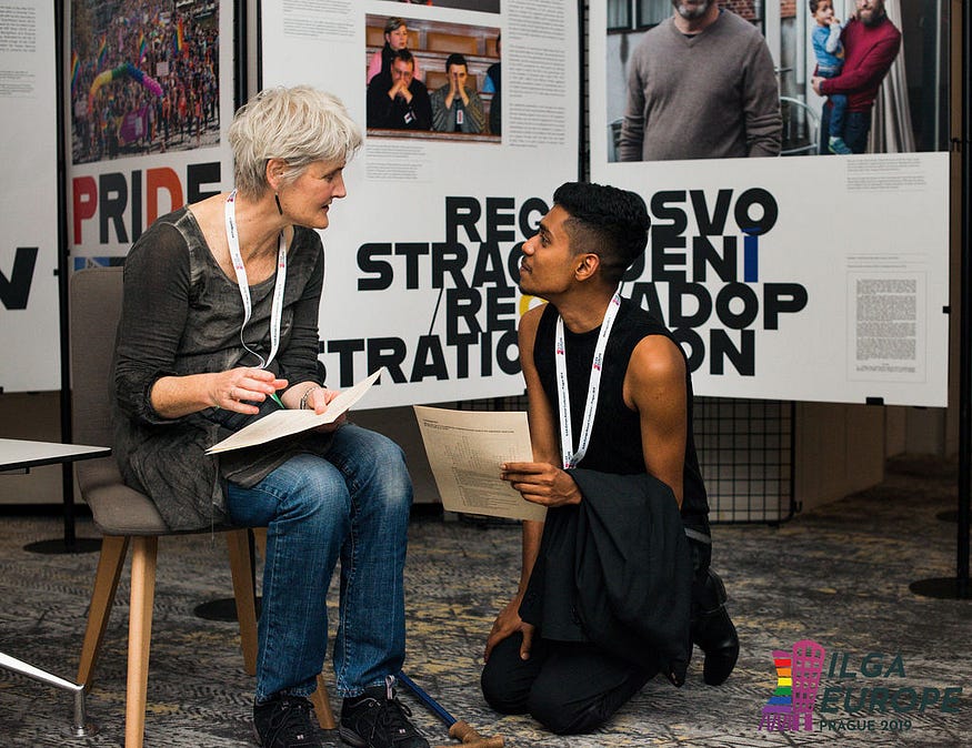 Two participants from differing generations engage in conversation