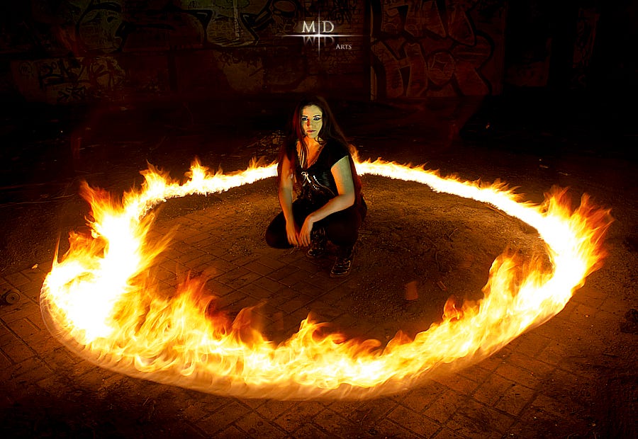 There were two women at my sides urging me to jump into the circle of fire....