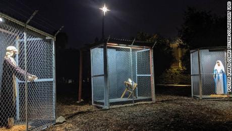 nativity scene with holy fam in cages