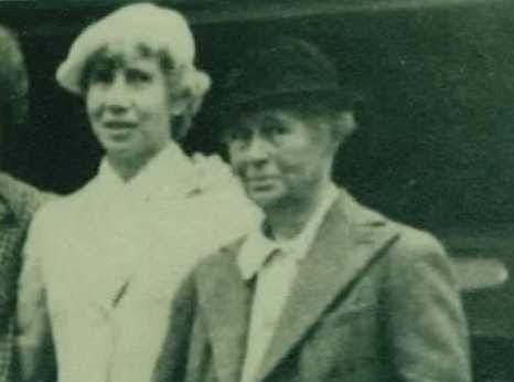 a portrait of tow women in a grayscale photo