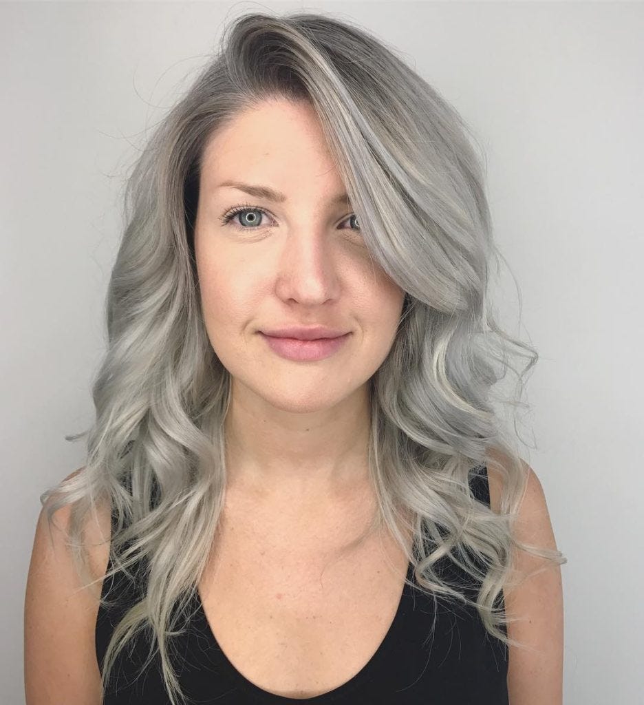 Wavy Layered Cut With Long Side Swept Bangs And Grey Blend Color
