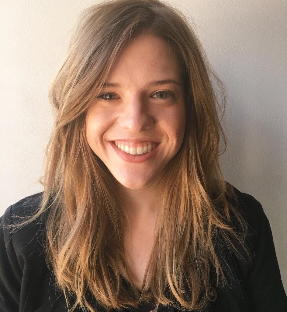 Long Razor Cut Layers On Warm Dirty Blonde Hair With Long Side