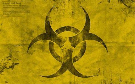 Biohazard symbol on a dusty yellow background.