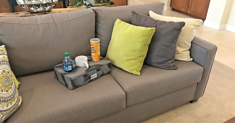 Cup Cozy Pillow Securely Holds Your Drinks On The Couch