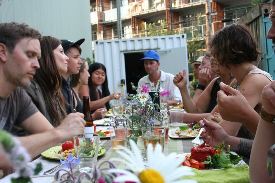 Potluck long table dinner in the garden