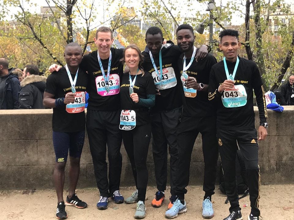 Noemie Marchyllie with her relay team at a Paris race
