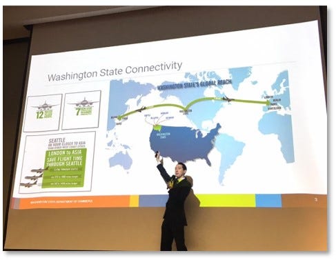 Image of a stage presentation by one of Commerce’s in-country representatives at US Business Day in Taiwan 2020. Washington was one of 8 US states represented during the event.