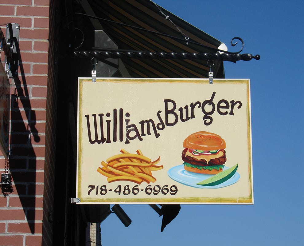 What is the Difference between Hand Painted Signs and Large Format